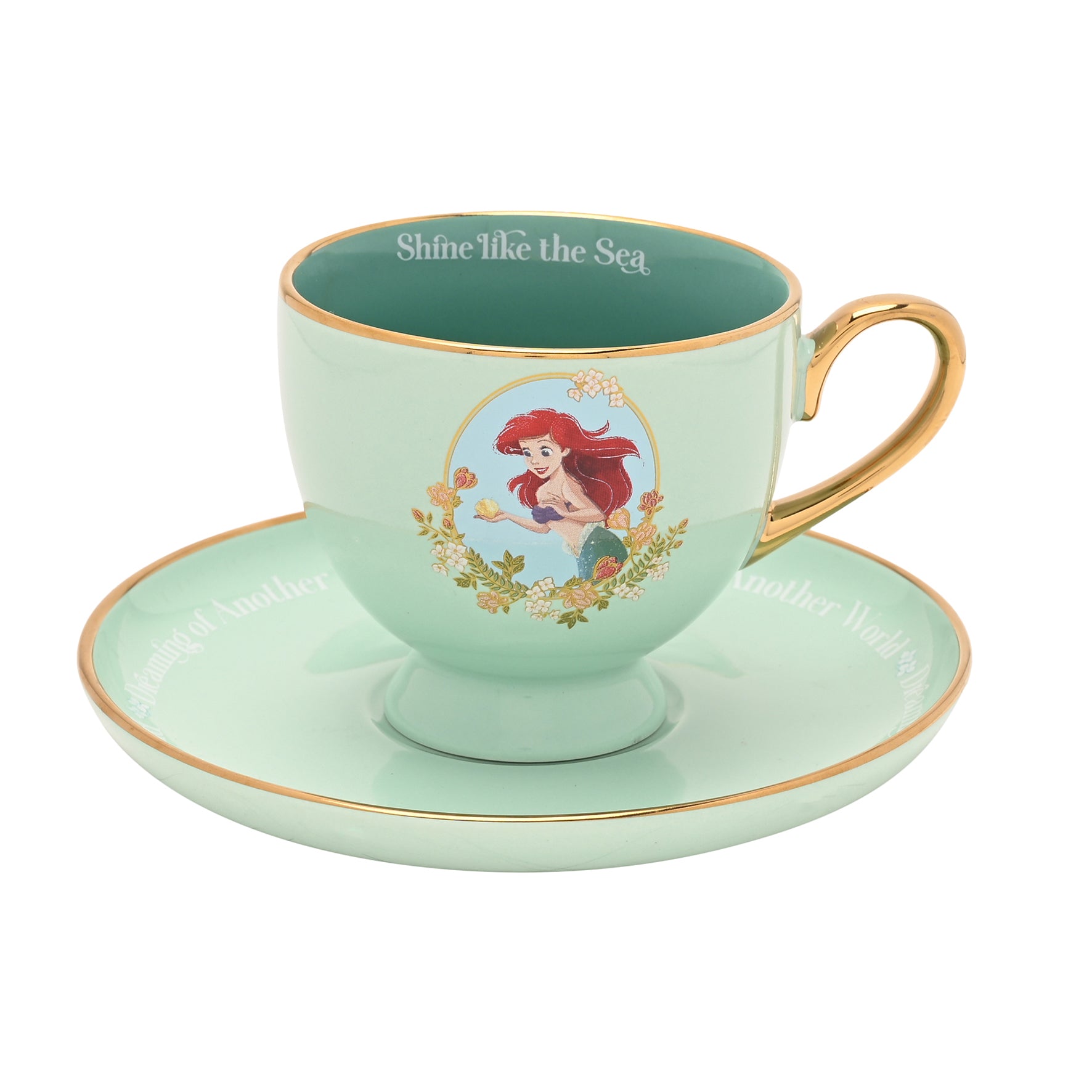 Mintgroen theekopje met goudkleurige rand en illustratie van prinses Ariel, op een bijpassend schoteltje.