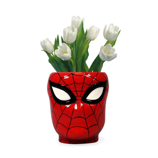 "Marvel Spiderman Muur Vaas/Pot: Voeg een vleugje heldhaftigheid aan je interieur met deze muur vaas/pot met het iconische Spiderman-logo. Een must-have voor fans van de Marvel-superheld."