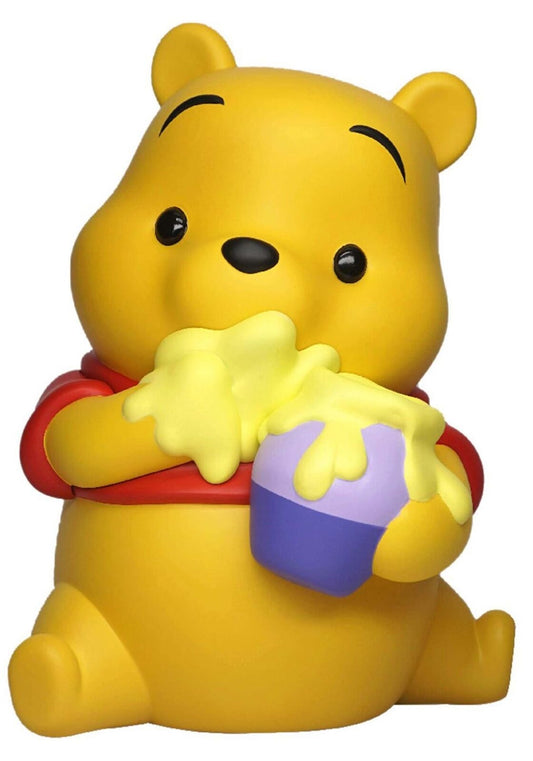"Disney Winnie the Pooh met honing Spaarpot: Een schattige spaarpot die Winnie de Poeh toont met zijn geliefde pot honing, perfect voor Disney-fans en liefhebbers van deze lieve beer."