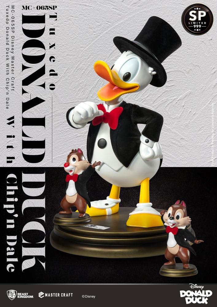 Donald Duck Master Craft collectible in luxe zwarte smoking met Knabbel en Babbel in bijpassende smokings.