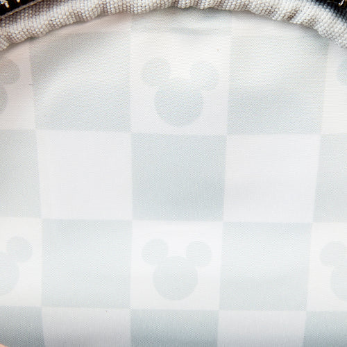 Rugzak-crossbody hybride tas, voorzien van een strak dambordpatroon en subtiele verwijzingen naar Mickey Mouse.