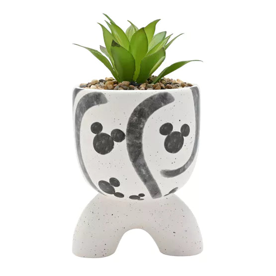 Breng charme in elke kamer met de Mickey Shapes arch-footed planter, een unieke en functionele plantenbak die elke ruimte opvrolijkt.