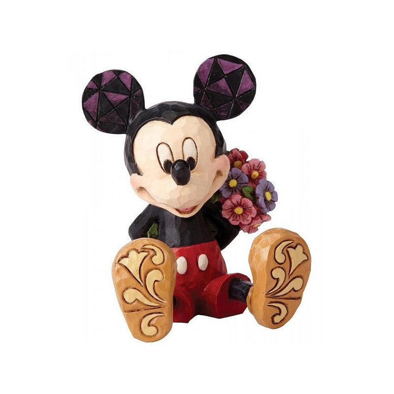 Traditions Mickey Mouse figuur versierd met kleurrijke bloemen, een unieke en gedetailleerde aanvulling voor elke Disney-fan.