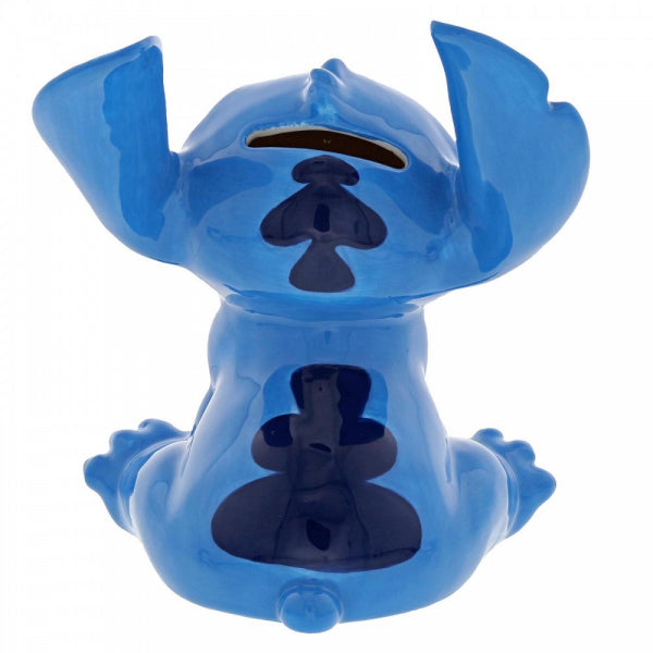  Ontdek de schattige achterkant van de Stitch Spaarpot, met een afmeting van 12.5x9x10.5cm. Bewonder Stitch's ondeugende glimlach terwijl hij zijn kenmerkende blauwe vacht toont. Deze kleurrijke en speelse spaarpot voegt een vleugje Disney-magie toe aan je besparingen. Geniet van het sparen met deze schattige Stitch Spaarpot en maak van elk moment een avontuurlijke herinnering!"